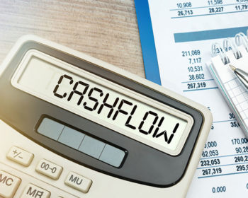 a calculator showing the word cash flow