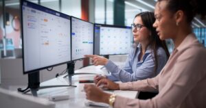 How Timely Payroll Supports Employee Retention and Business Stability 1 Black,Woman,Using,Payroll,Software,To,Manage,Diverse,Staffing,Company.